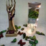 Handmade bracelet of stones with red, white and black colors.                                                                            سوار لليد مصنوع يدويا من الأحجار و الخرز ذات اللون الأحمر و الأبيض و الاسود