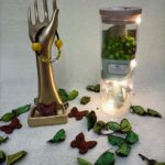 Handmade bracelet of yellow smiley beads and black beads.                                             سوار لليد مصنوع يدويا من خرز سمايلي أصفر مع الخرز الأسود بتصميم مميز