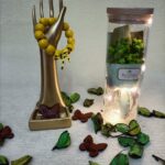 Handmade bracelet of yellow wooden beads and a specially designed yellow& black ribbon.                                                        سوار لليد مصنوع يدويا من الخرز باللون الأصفر و مزينه بشريط مميز من اللون الاسود و الاصفر